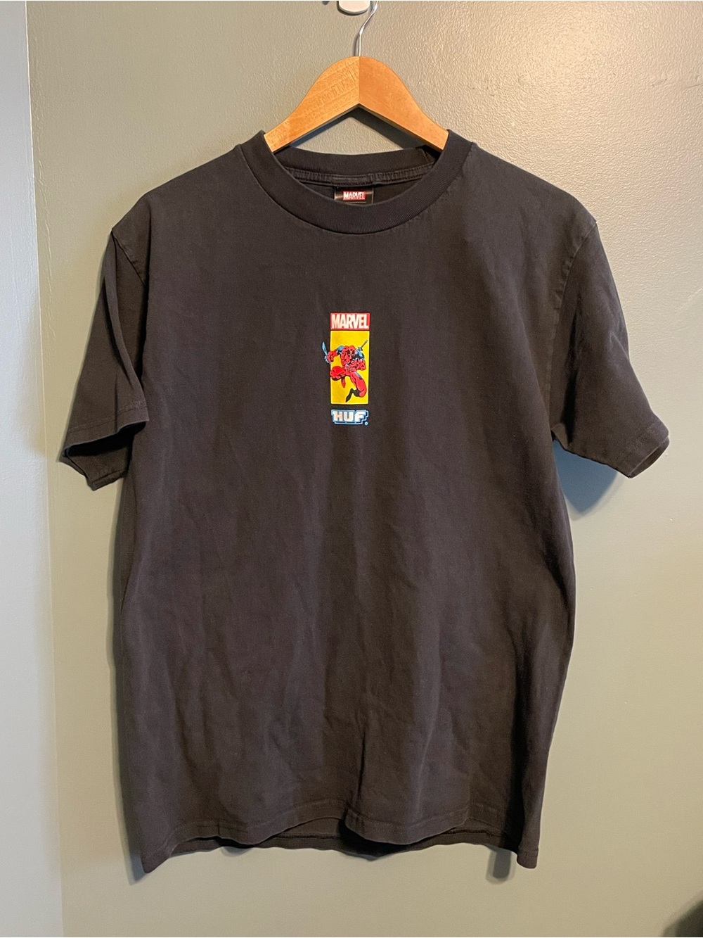 HUF Black Short-Sleeve Tee with Red, Yellow & Blue Marvel Graphic